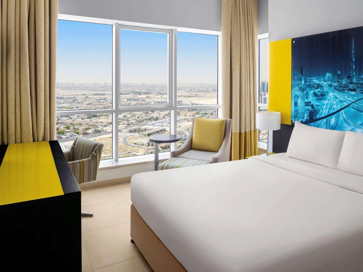 อพาร์ตโฮเต็ล อดาจิโอ พรีเมี่ยม ดูไบ อัล บาร์ชา Aparthotel ภายนอก รูปภาพ